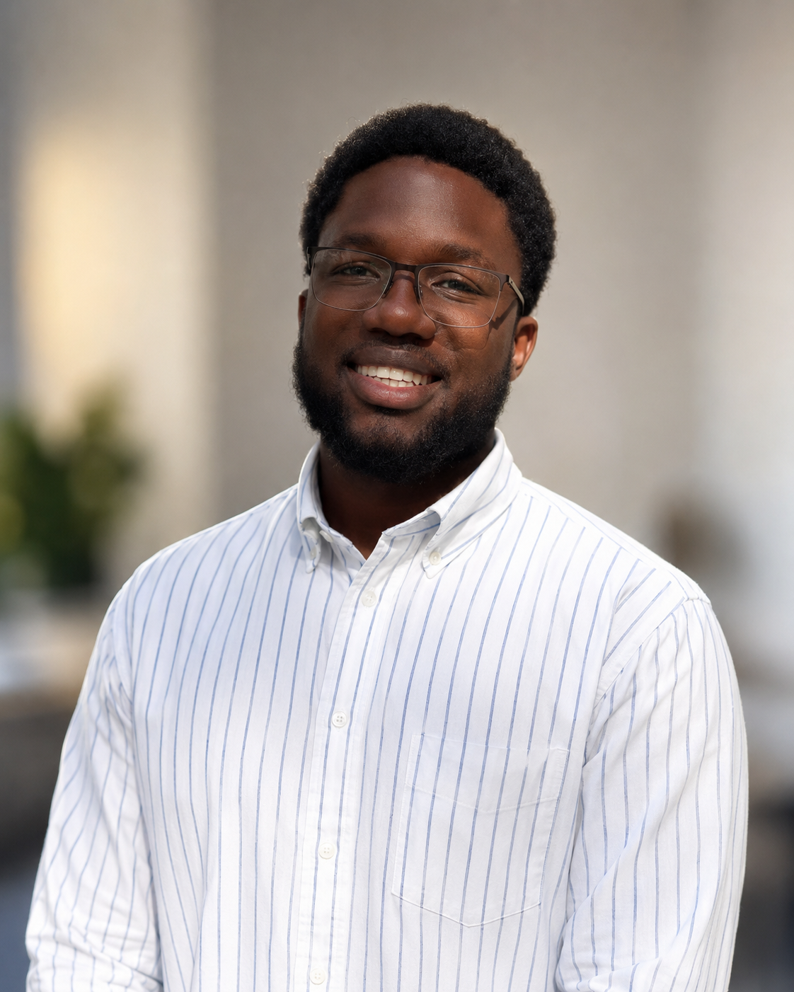 Headshot of David Emelu, GIS Analyst at Camber & Core Systems.
